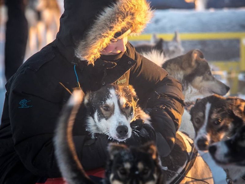 Cuddle break at Yellow Snow Husky Tours