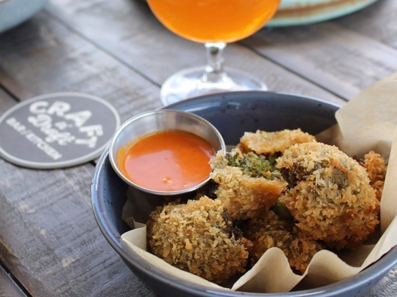 A burger and snacks at Craft n' Draft
