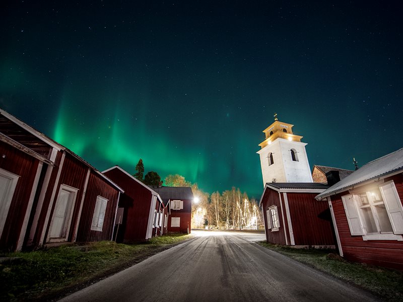 Northern lights over Gammelstads Kyrkstad