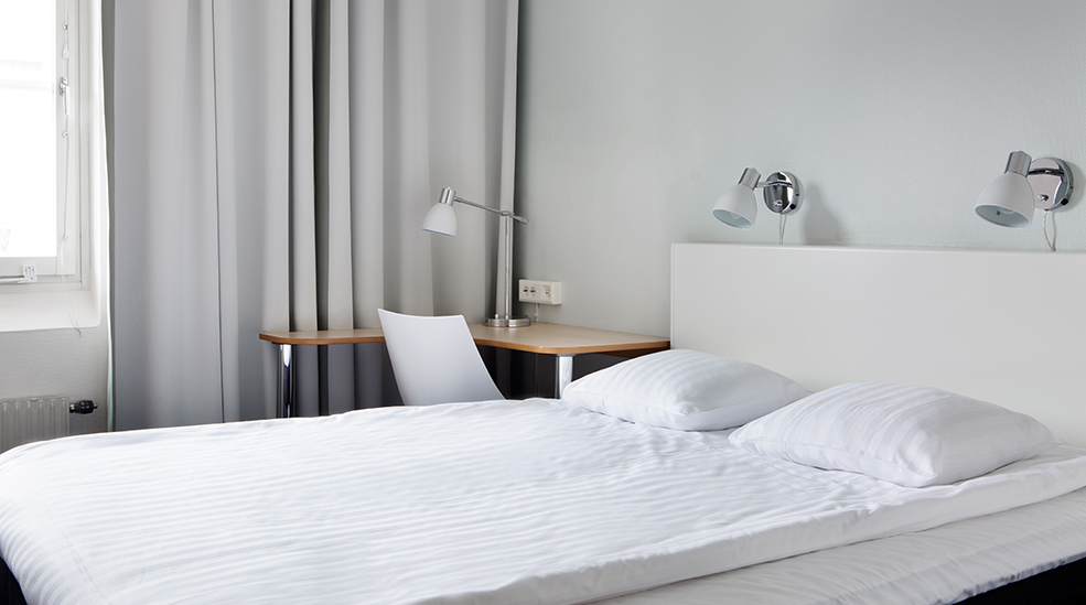 Arctic Hotel Queen Bed1