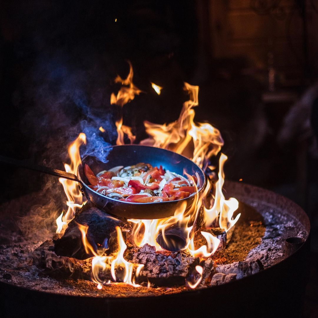 Dinner over open fire at Brändö Lodge