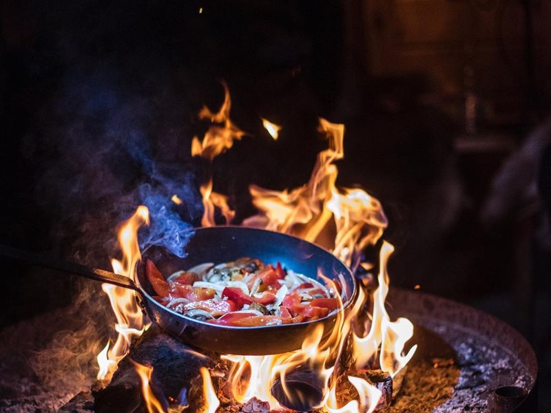 Dinner over open fire at Brändö Lodge